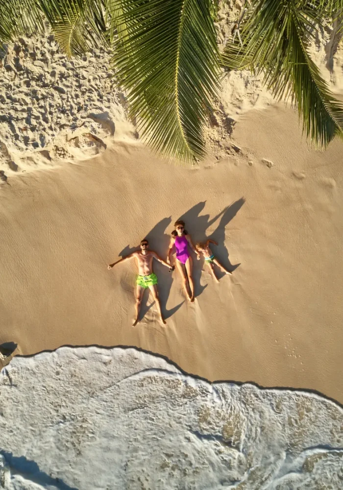 family-on-beach-at-seychelles-aerial-top-view-2026-01-05-06-03-06-utc